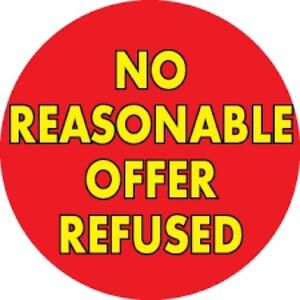 Red Circular Sign with Yellow Text